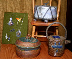 Jewelry by Metje Butler, pottery by Susan Moore?